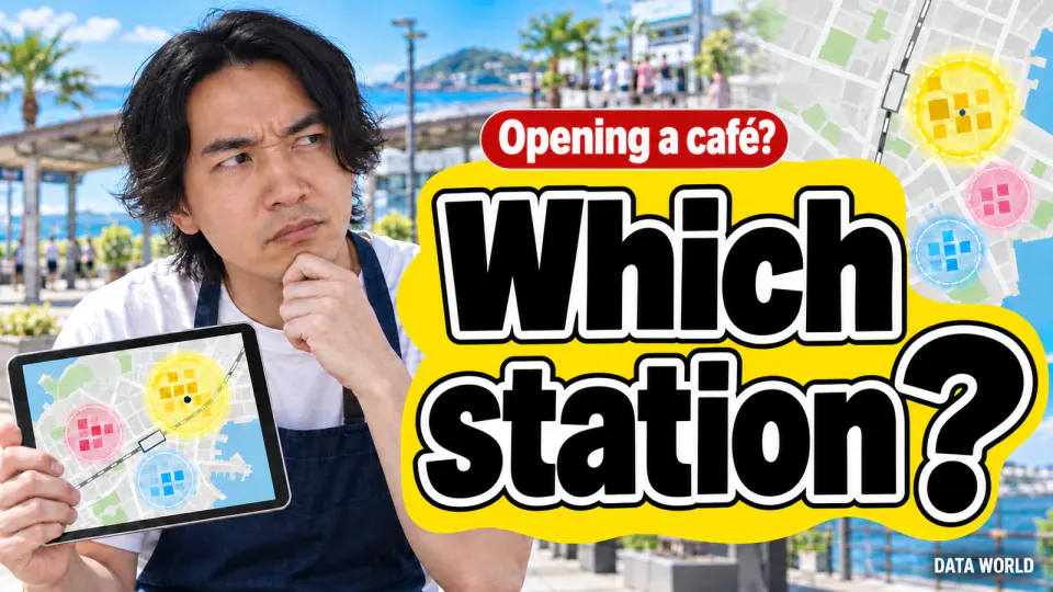 Opening a café? Which station? In a sunny seaside station plaza, DATA TIMES editor-in-chief Kaito Ogasawara, in a navy apron, rests his chin on his hand with a doubtful look, holding a tablet showing a map with three circles. On the right, giant black letters on a yellow band read "Which station?" under a small red tag reading "Opening a café?"