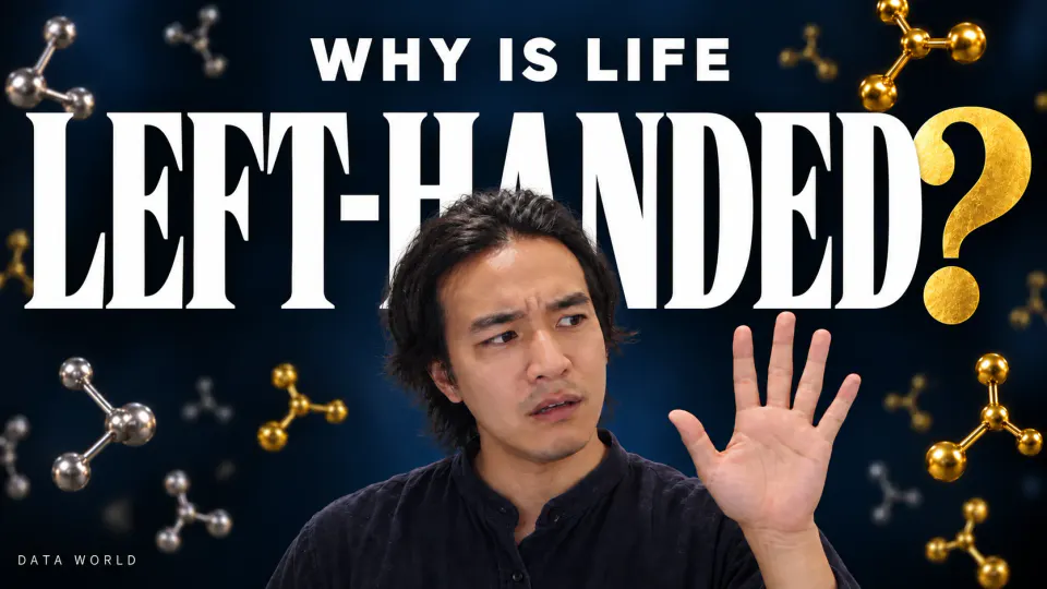 Why is life left-handed? Against a deep navy background, giant white letters read "LEFT-HANDED" with a gold question mark. In front of them, DATA TIMES editor-in-chief Kaito Ogasawara holds up his open left hand toward the camera with a puzzled frown. Gold and silver molecule models float around him, and small text above reads "WHY IS LIFE".